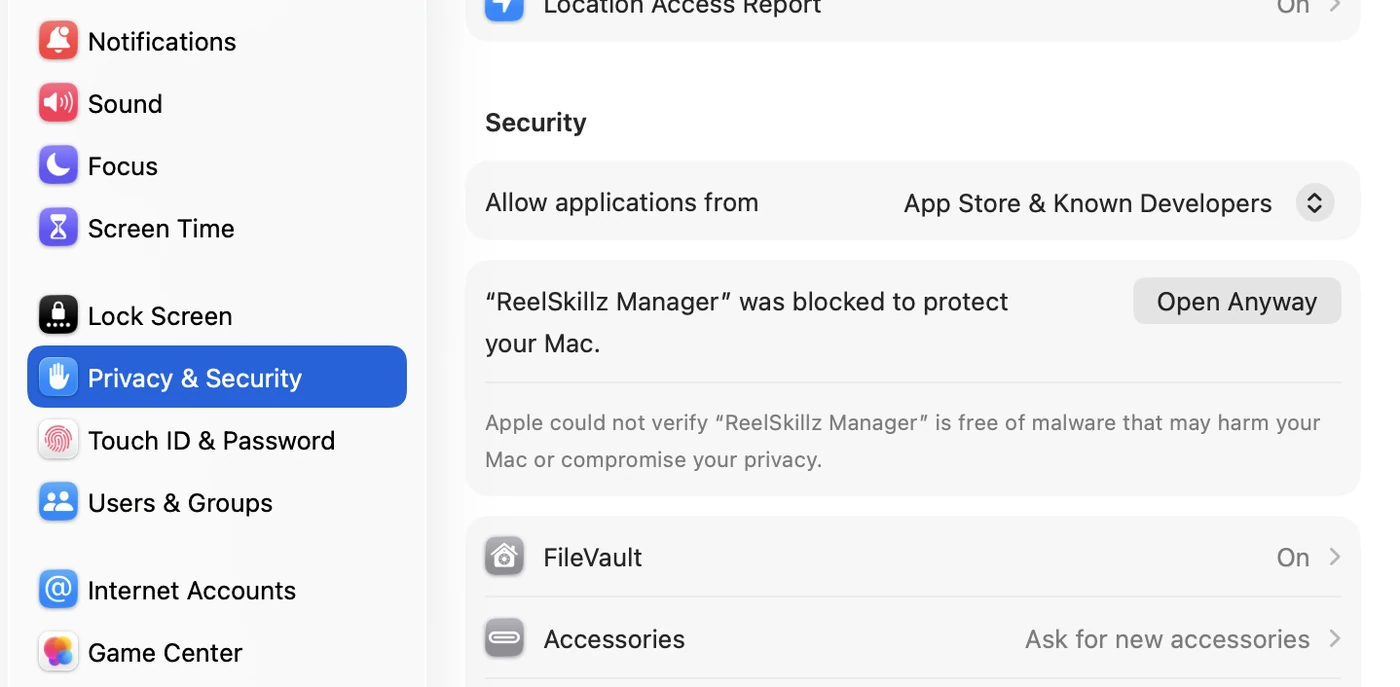System Settings, Privacy and Security pane, showing the Open Anyway button next to the blocked ReelSkillz Manager message